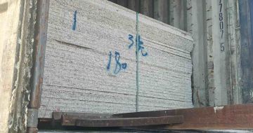 鸡西 芝麻白花岗岩石材3.0公分光面毛板装柜出货