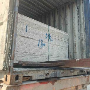 鸡西 芝麻白花岗岩石材3.0公分光面毛板装柜出货