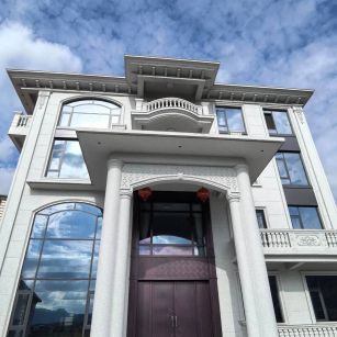 鸡西白麻别墅外墙干挂石材效果示例