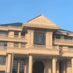 鸡西黄金麻别墅外墙干挂石材效果示例