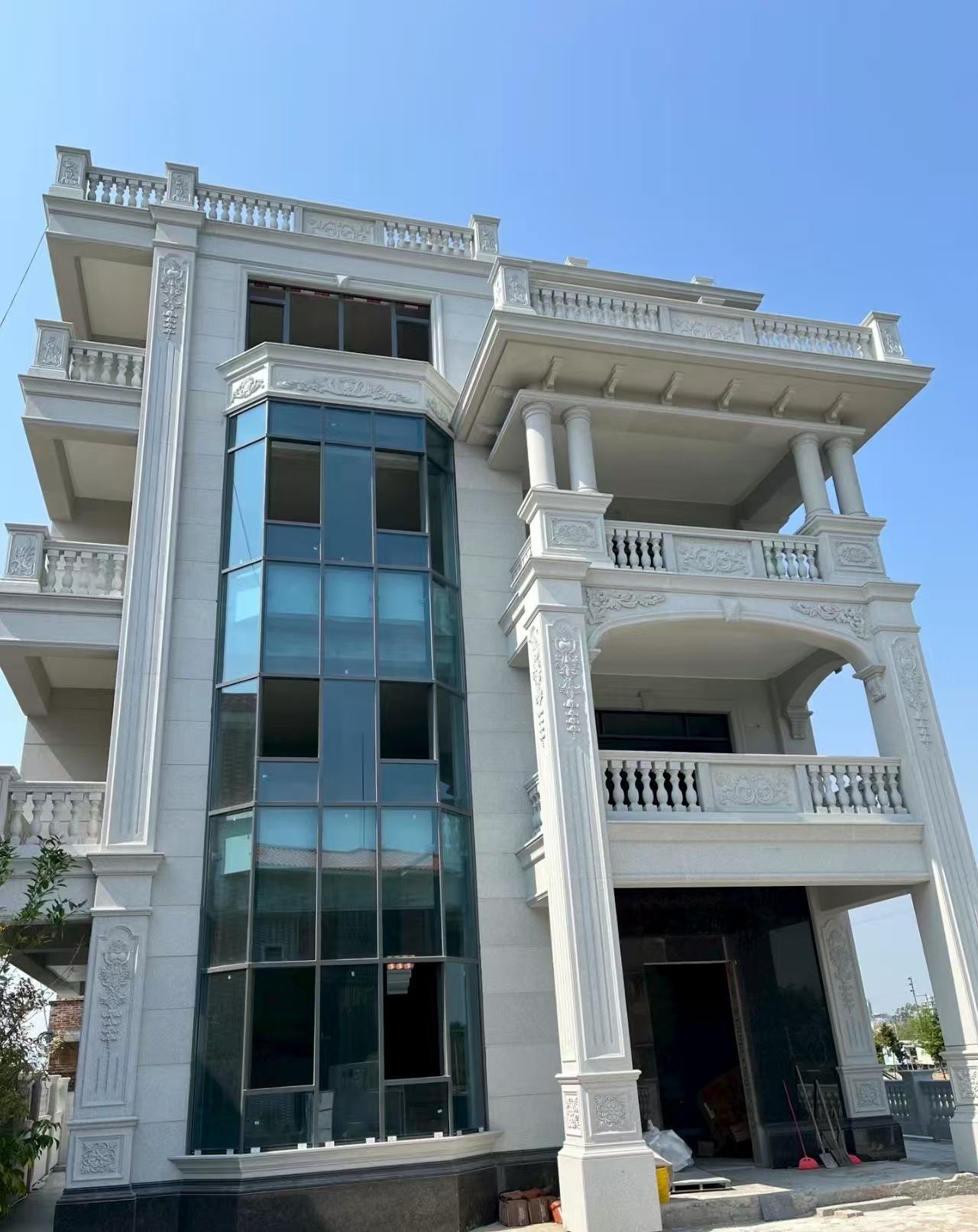 鸡西 白麻花岗岩别墅外墙干挂效果展示