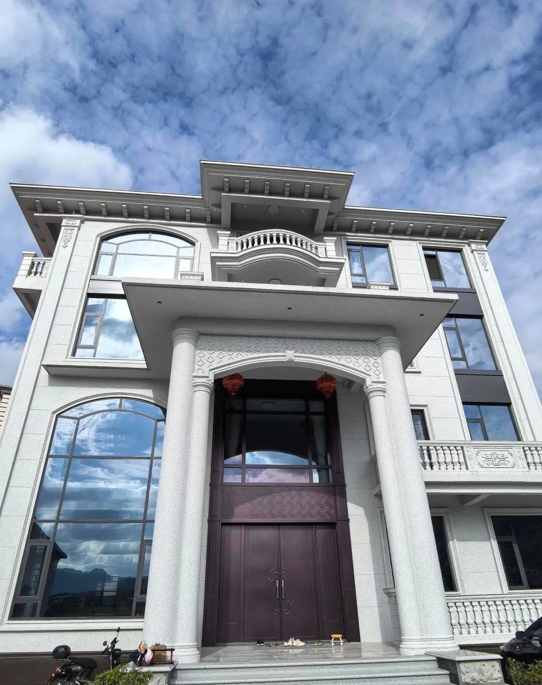 鸡西白麻别墅外墙干挂石材效果示例