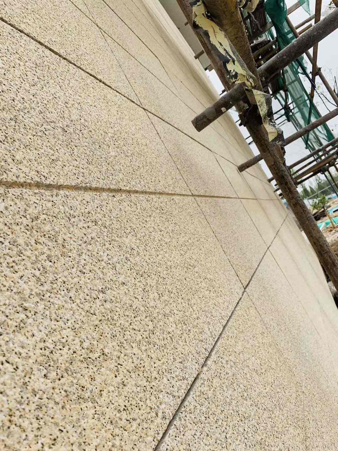 鸡西 黄金麻花岗岩荔枝面外墙干挂石材效果示例